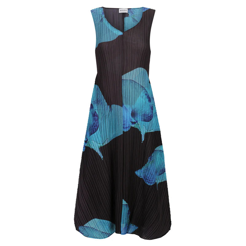 Alquema Estrella Dress with bold blue floral print, pleated bodice, and voluminous skirt, perfect for outerwear and coats