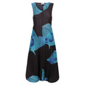 Alquema Estrella Dress with bold blue floral print, pleated bodice, and voluminous skirt, perfect for outerwear and coats