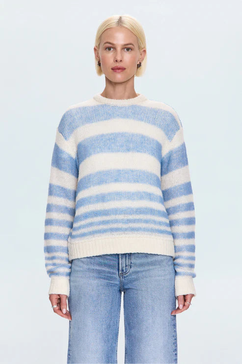 Front view of blue and white striped knit sweater