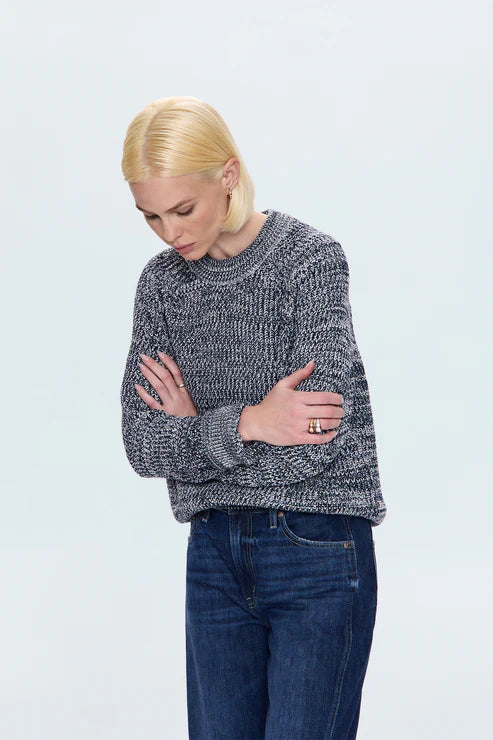 Women wearing navy marl knit sweater with relaxed fit, casual style